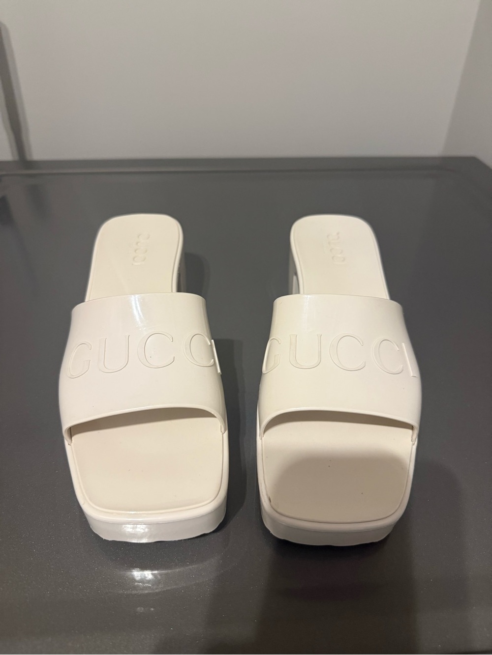 Gucci Cream Slide Mules with Embossed Logo